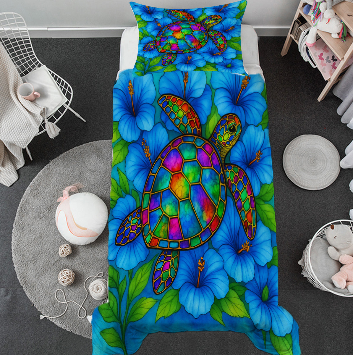 Colorful turtle and flower patterned comforter on a bed in a room setting.