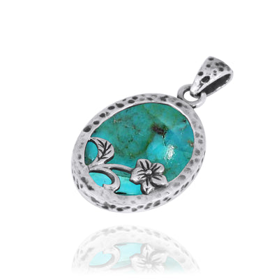 Sterling Silver Oval Compressed Turquoise Pendant with Silver Flower